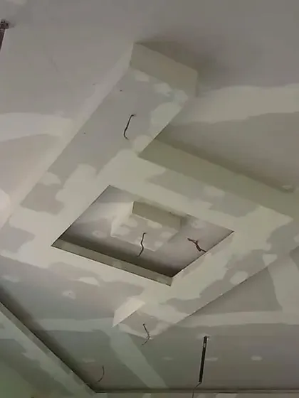 A simple yet effective geometric design in progress. The wiring is ready for spotlights to be installed within the recessed sections.