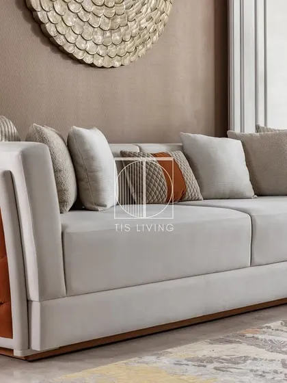 The side-layer quilting on this sofa is a detail that sets it apart. This is an example of the fine upholstery work we specialize in, adding texture and a touch of bespoke luxury to anchor a room.