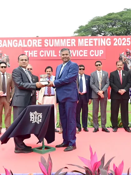 Shri. Manoj Kumar, IFS, presents The Civil Service Cup to the owner of Golden Thunder.