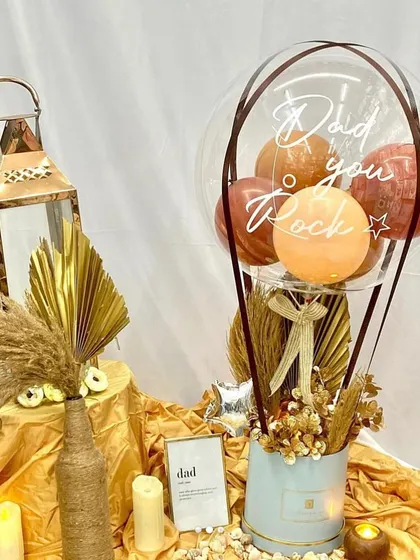 We created this special hamper for Father's Day with the message "Dad you Rock". The rustic, earthy tones of the dried flowers and the warm lighting from the lantern create a sophisticated and heartfelt gift.