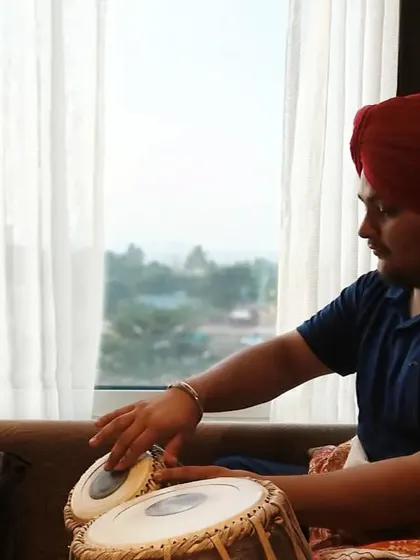 Practicing by the window. Finding moments for riyaz (practice) wherever I am is crucial to staying connected with my craft.