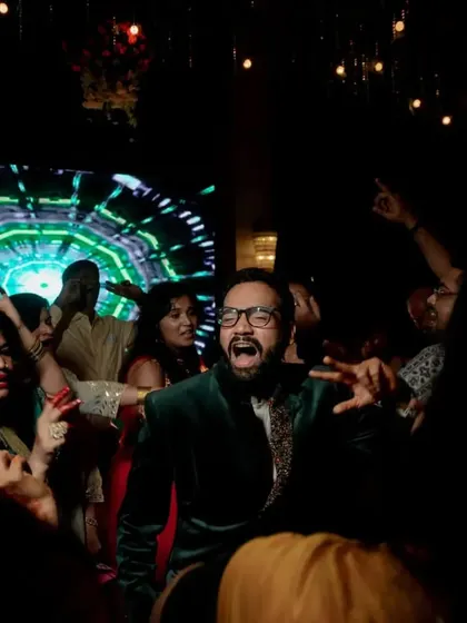 The groom enjoying himself on the dance floor at the Sangeet after-party.