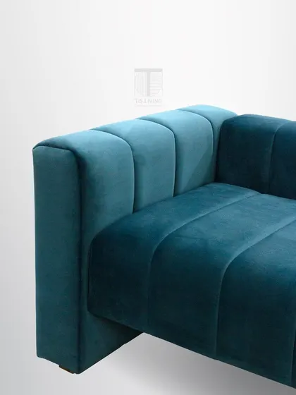 A close-up of the channel tufting, a detail that adds texture and a sense of rhythm to the design.
