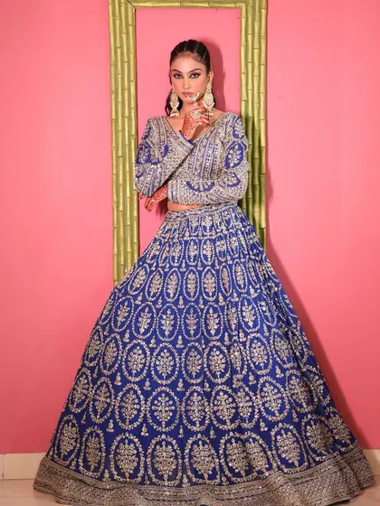 A full-length shot of the royal blue lehenga, showcasing its beautiful silhouette.