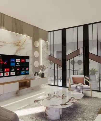 A 3D visualization of a living room with a marble TV wall and a glass partition that offers a view of the staircase, creating a sense of depth and openness.