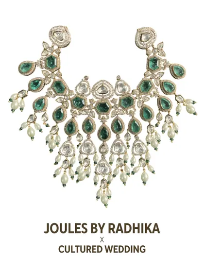 A clean product shot of the emerald and polki diamond necklace featured in Cultured Wedding Magazine, highlighting its intricate design and craftsmanship.