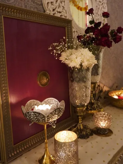 A close-up of the festive decor on my console table. The mix of different candle holders and vases creates a layered and interesting look.