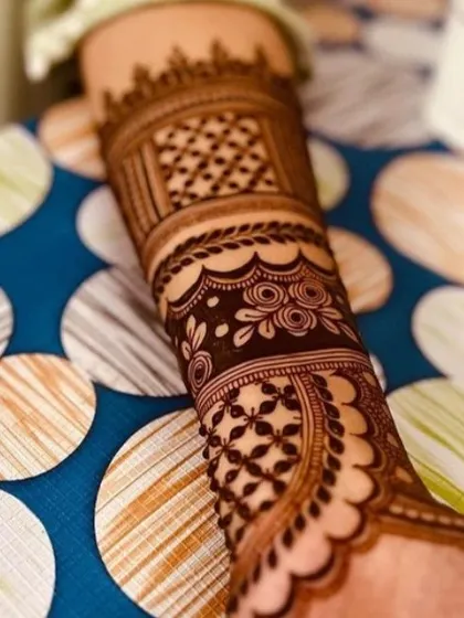 This Rajasthani armband features a mix of floral, net, and line work, creating a beautiful cuff effect.
