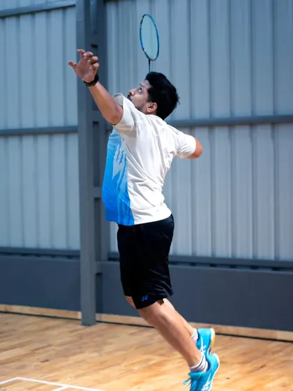 A player in our adult program executes a jump smash, showing that high-level techniques can be learned at any age with the right guidance.