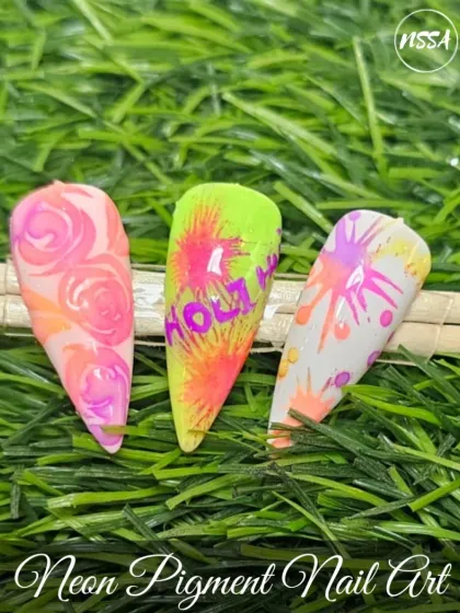 Get ready for Holi with these vibrant neon pigment nails. This set features a fun "Holi Hai" design, splatters, and floral patterns, capturing the joyful spirit of the festival.