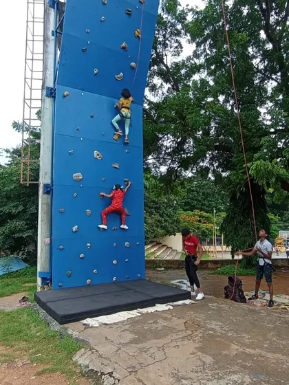 Young climbers practice top-roping on the Davangere wall under the supervision of our staff, learning safe climbing practices from an early age.