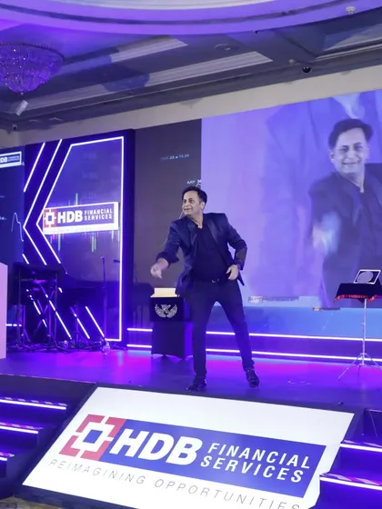 The energy on stage is electric during corporate events like this one for HDB Financial Services. I love bringing a dynamic mix of magic and entertainment to celebrate company milestones.