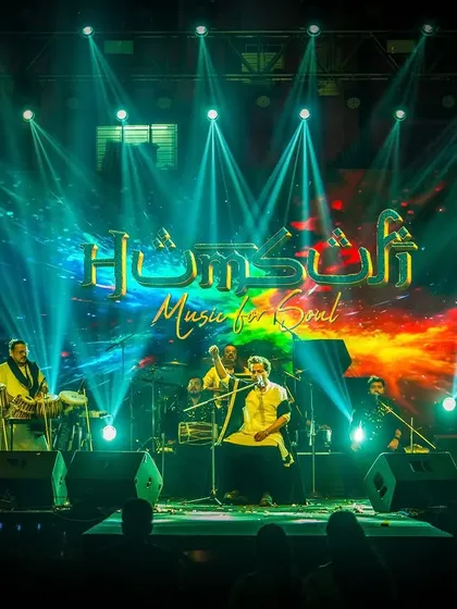 The full band setup at SURGE 2024. The vibrant stage and lighting reflect the high-energy performance we delivered for the students.