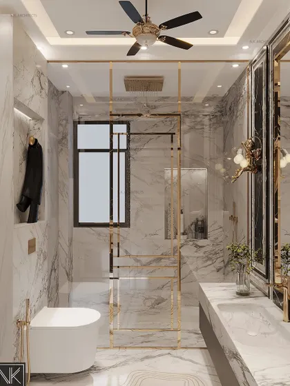 We designed and executed this stunning washroom with a neoclassical vibe. It features elegant wall mouldings and a mix of black and white marble, with gold accents in the shower partition and fixtures.