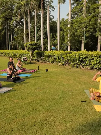 Leading the group through pranayama (breathing exercises). I teach the importance of breath control for both physical performance and mental clarity.