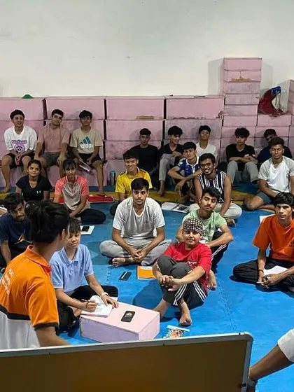An interactive moment during our workshop on WT rules. Students are encouraged to ask questions and engage, ensuring they fully grasp the technicalities of the sport.