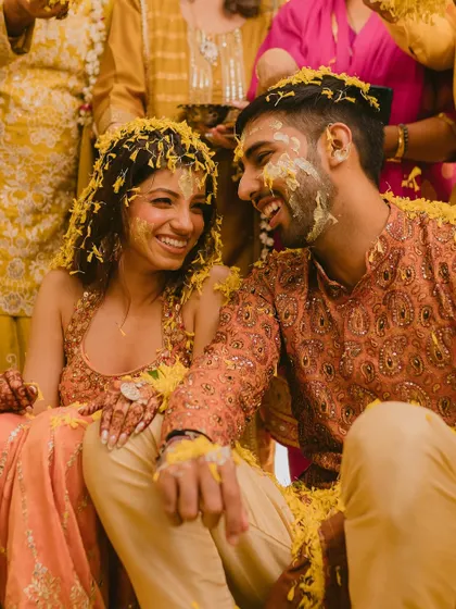 Laughter and love at the haldi ceremony. My goal is to make you feel so comfortable in your makeup that you can completely enjoy these moments.