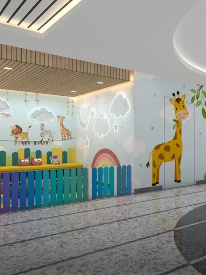 This pediatric play and waiting area at Yashoda Medicity uses colorful, friendly animal graphics and a rainbow-themed fence. The design creates a cheerful and engaging environment to make the hospital experience less intimidating for children.