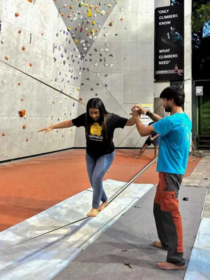 Celebrating our 5th anniversary with a team based competition. Here, a participant tries her hand at slacklining, one of the fun challenges of the day.