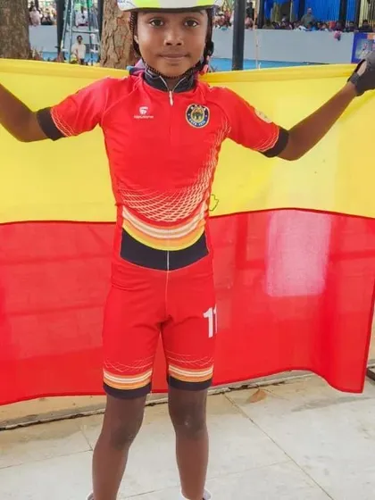 Our strong girl Veeksha, a national bronze medalist, proudly holding the Karnataka flag.