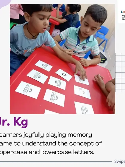 Teamwork makes learning even more fun! These Junior KG students are playing a memory game together, helping each other match uppercase and lowercase letters. This collaborative activity reinforces their learning while building social skills.