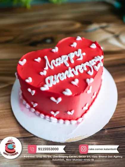 A simple and sweet red heart-shaped cake for an anniversary. The classic design and heartfelt message make it a timeless choice to celebrate your love.