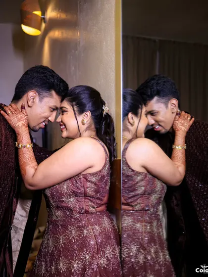 A creative shot using a mirror to capture the couple's reflection and their intimate gaze.