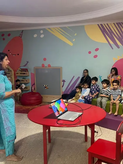 Story time during our Janmashtami celebration. The children are captivated as they listen to tales about Lord Krishna's childhood.