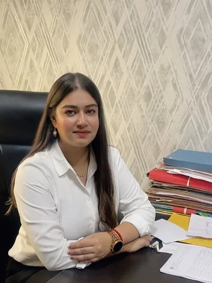 At my desk, surrounded by case files. My experience in corporate and employment law is at your service, ensuring you get practical and effective legal representation.