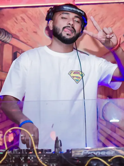 Rocking a Superman shirt behind the console. Sometimes you have to be a hero on the dance floor and save the night with the perfect track.
