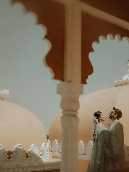 A majestic portrait using the location's unique architecture. I framed the couple against the domes of the palace, creating a sense of grandeur and timeless romance.
