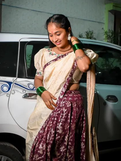 A happy client enjoying her event in one of my traditional half sarees. Renting allows you to wear these beautiful outfits without the commitment of buying.