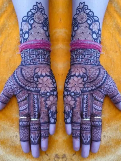 A beautiful design with floral motifs and intricate check patterns.