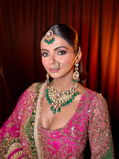 A final portrait from this shoot, capturing the complete royal bridal look. The makeup is designed to be timeless and elegant.