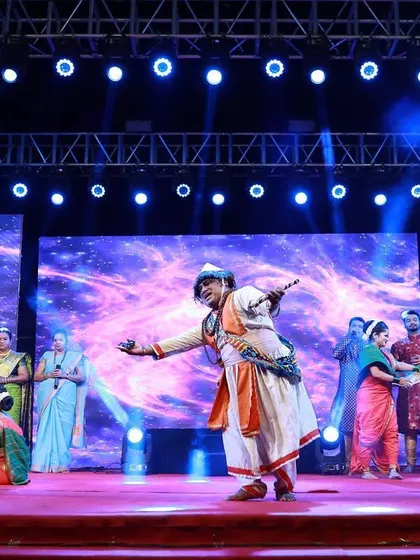 My stage setups are designed to accommodate large groups of performers. This wide shot shows a full cast on stage during a cultural performance, with the lighting and LED screens creating a rich and vibrant backdrop.