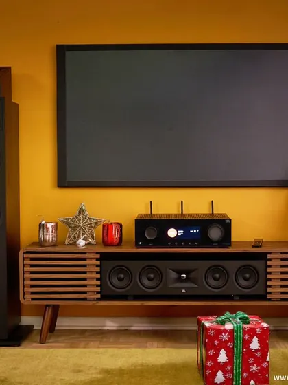 A complete JBL home theater system, ready for Christmas. This setup is the perfect blend of power and style, designed to make every moment unforgettable with the ultimate in festive sound.