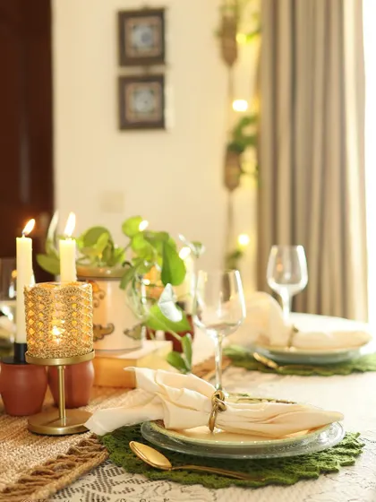 A full view of the table set with the olive green placemats, creating a cohesive and elegant look.
