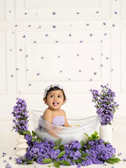 A playful moment, sticking her tongue out while enjoying the lavender bath. I love capturing these quirky, personality-filled expressions.