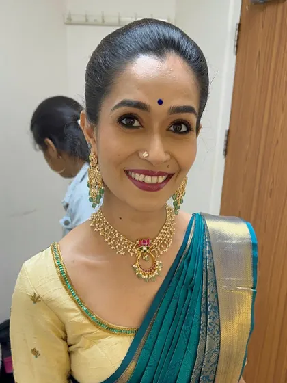 A happy smile after the makeup is complete. My goal is for every dancer to feel this sense of joy and readiness before they step out to perform.