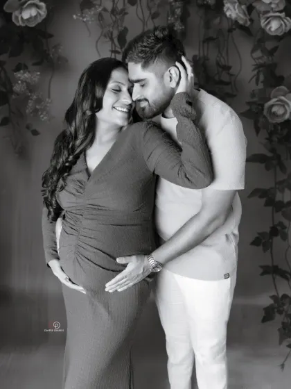 The love and tenderness in this embrace are beautifully highlighted in this black and white couple's portrait. A timeless keepsake from their maternity journey.