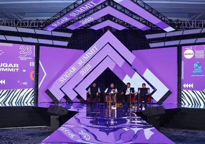 A view from the stage of the 'Sugar Summit.' The dynamic design and advanced AV setup created an engaging and memorable experience for the panelists and the large audience.