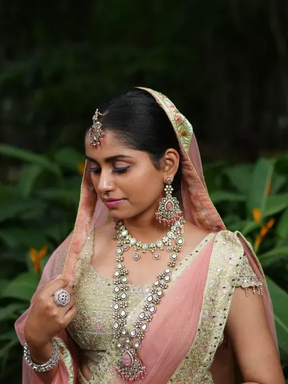 A closer look at the pastel Victorian-Polki set, showing the detail on the layered necklace, choker, and statement earrings.