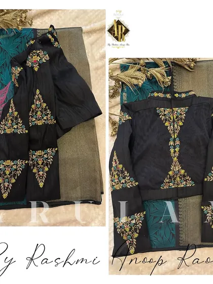 A unique black blouse with multi-color triangular embroidery motifs. This design was created to match the colors of the client's existing saree.