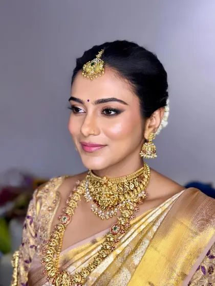 A duplicate of ID 65, this image further showcases the radiant bridal look.