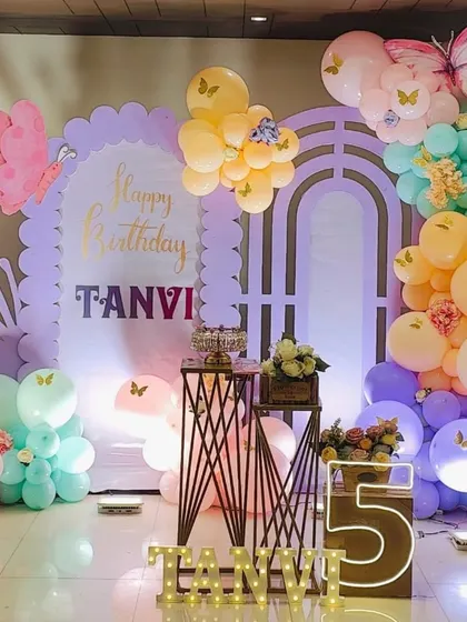 A duplicate shot of the beautiful pastel butterfly theme for a 5th birthday.