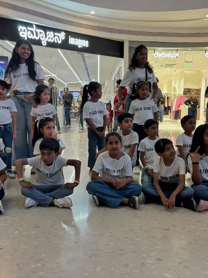 Our junior dancers getting ready for their big performance. We ensure everyone feels prepared and excited before hitting the floor for a public event.