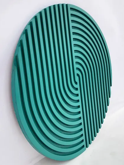 An angled view of the teal version, showing the layered depth of the carved arches.