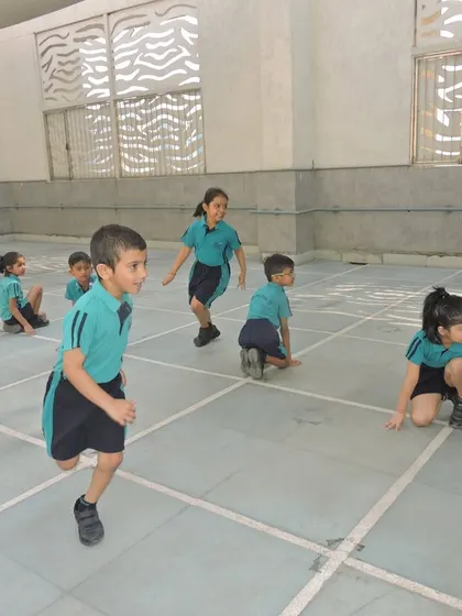 Students engaged in a game of Kho-Kho, a traditional sport that builds speed, agility, and strategic thinking among teammates.