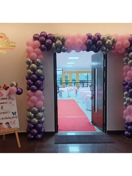 Another view of the beautiful butterfly-themed entrance arch.