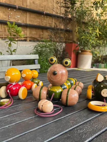 Our family of pull toys, including the wobbly caterpillar and the Oinkston pig, are perfect companions for little adventurers. Made with safe, natural materials, they encourage movement and imaginative play.